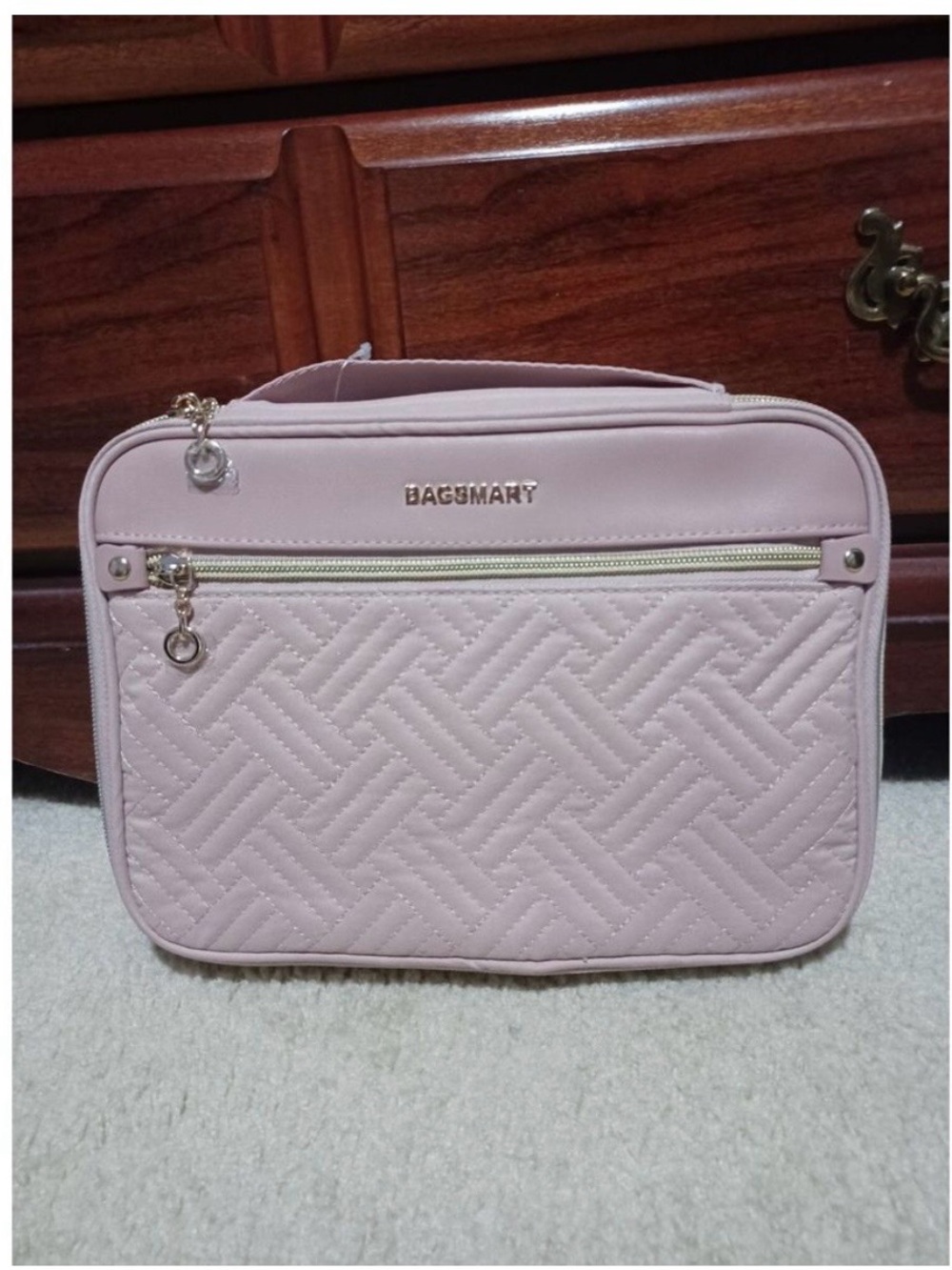 BAGSMART pink quilted electronic travel bag with gold color hardware